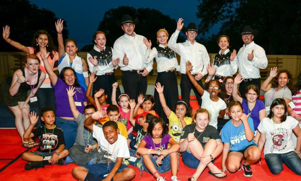 Peter Michelena and the Aggie Wranglers at a youth community event